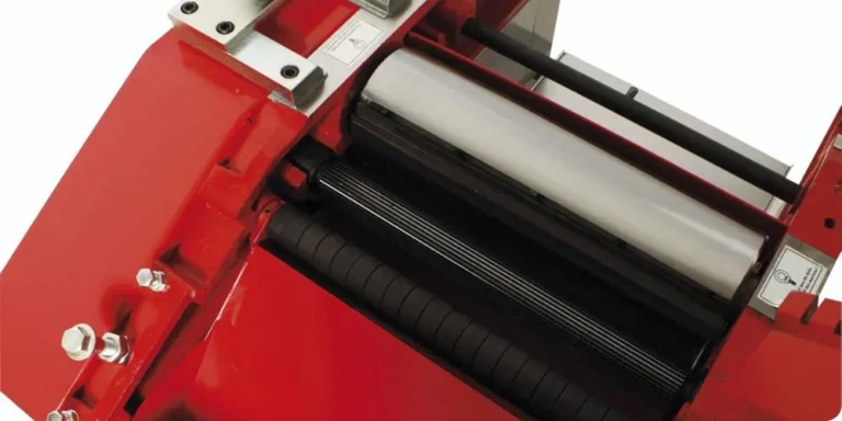 Réglage des rouleaux entraîneurs de raboteuse